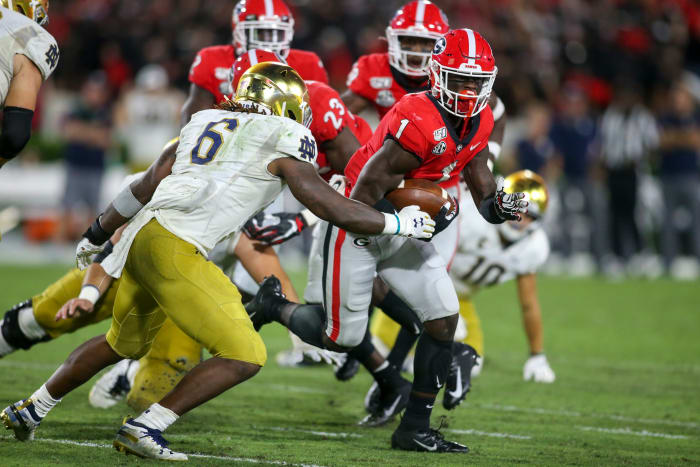 Divaad Wilson running with the football after an interception versus Notre Dame (2019)
